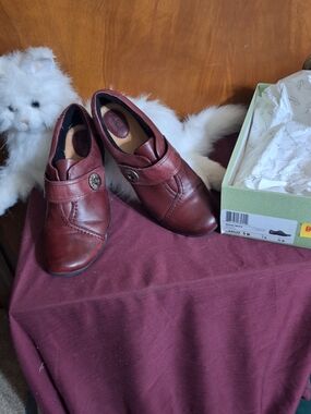Clarks Women's Burgundy Leather Slip-On Loafers with Decorative Button
